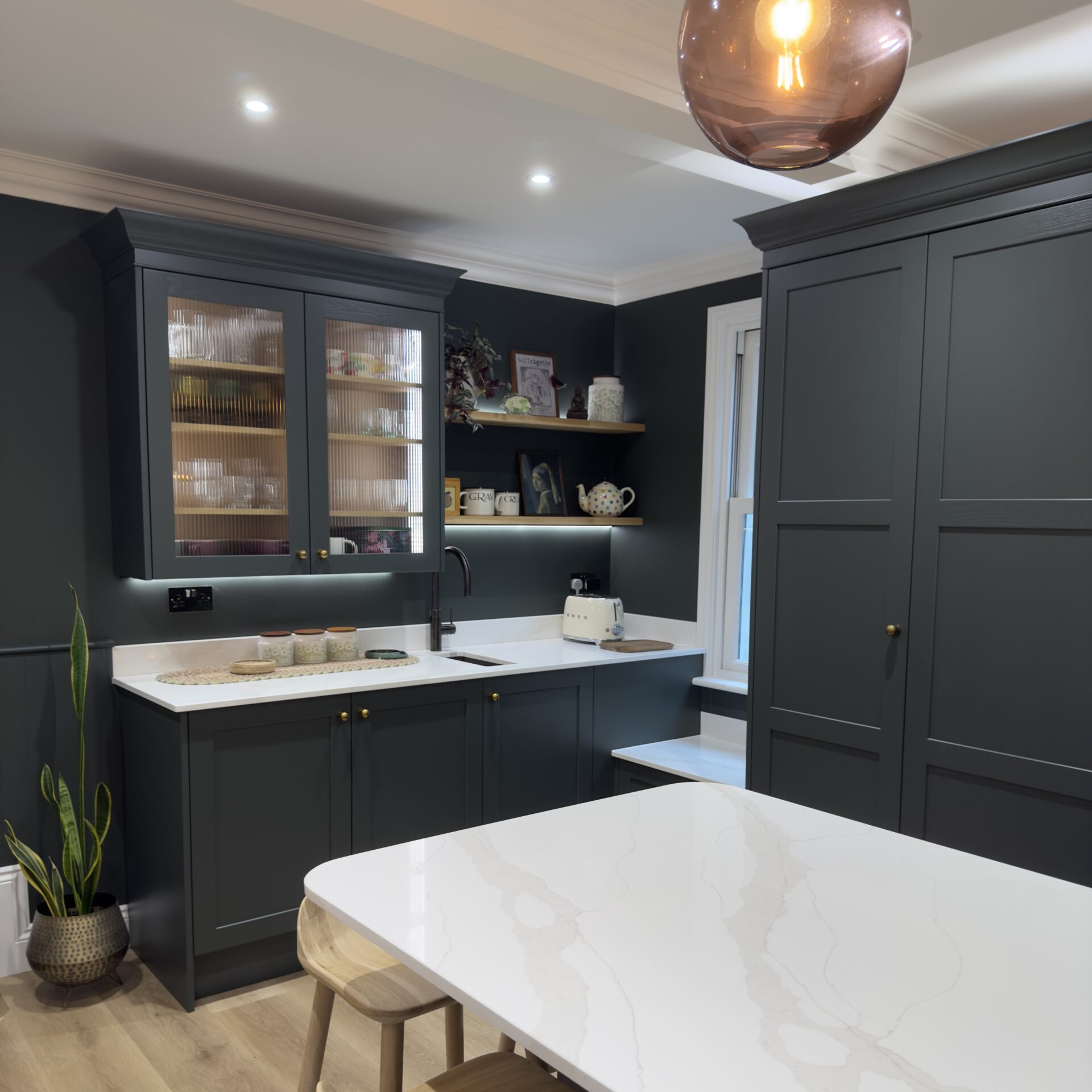 Breakfast bar island in Milton Keynes kitchen Period kitchen with Quooker
