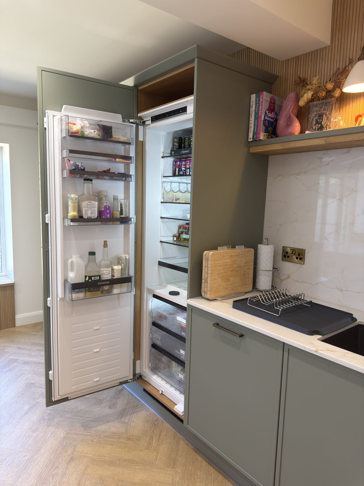Built in appliances milton keynes Kitchen with integrated fridge door open