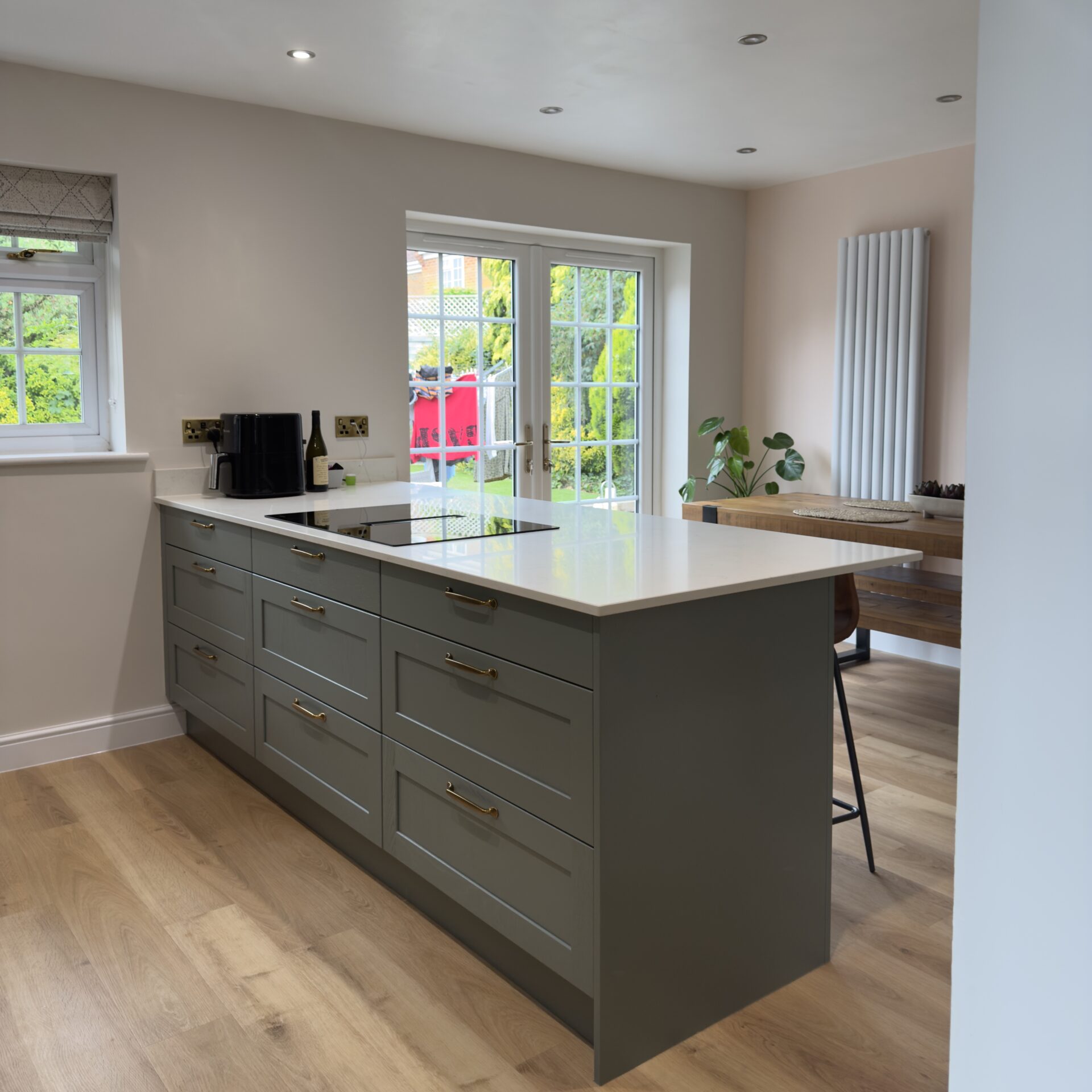 View from utility – focus on peninsula Kitchen return with integrated hob